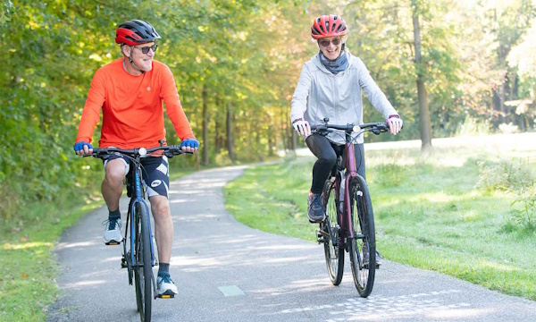 Two-Cyclists-on-a-Bike-Path.jpg