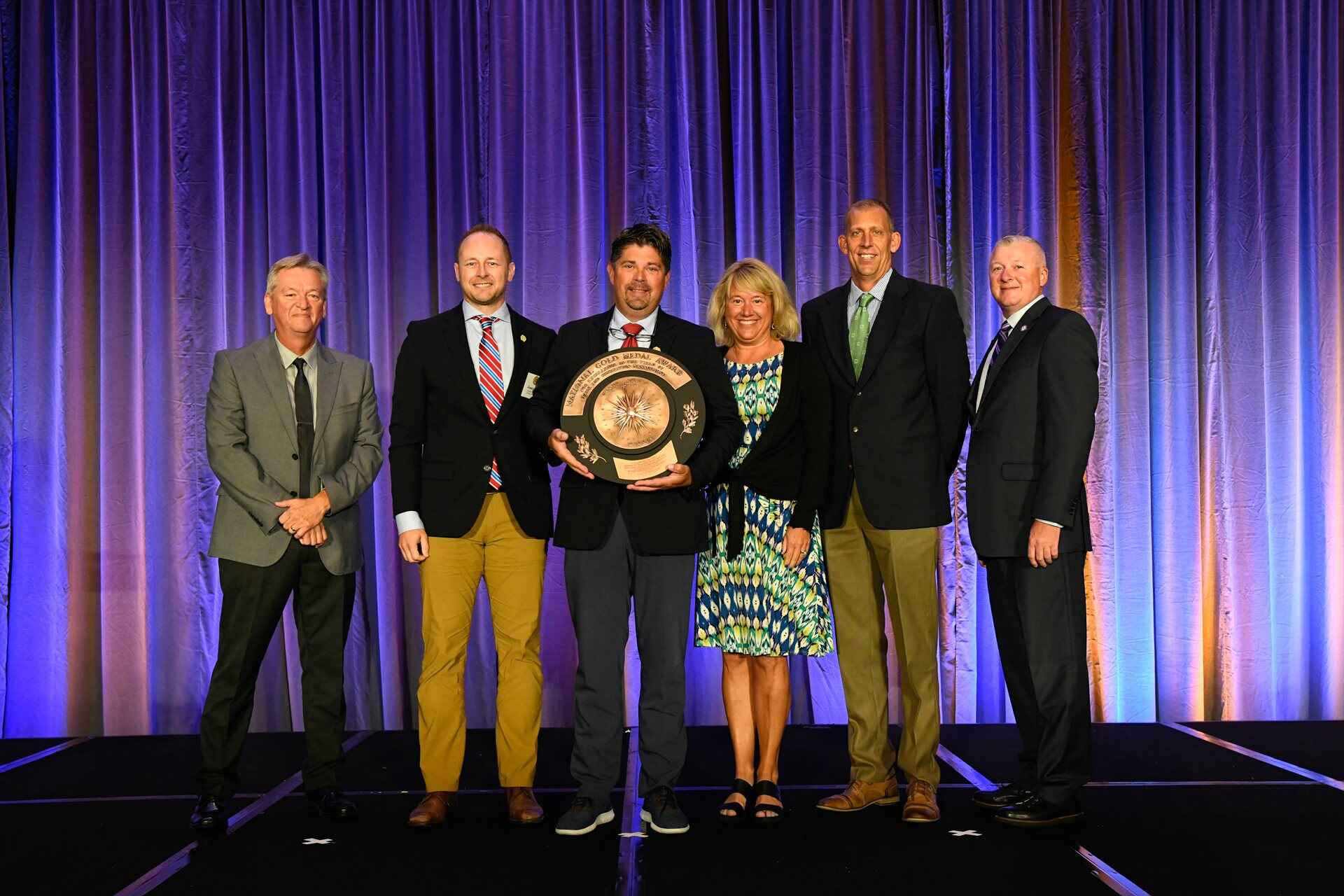 Award-photo_Brian-holding-award_1.jpg